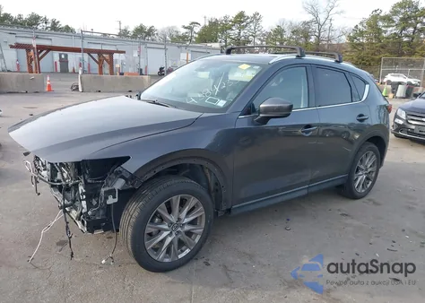 2021 Mazda Cx-5 Grand Touring z USA, uszkodzony, nr VIN JM3KFBDM5M0469257